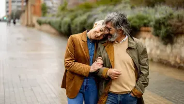 Couple walking down the street
